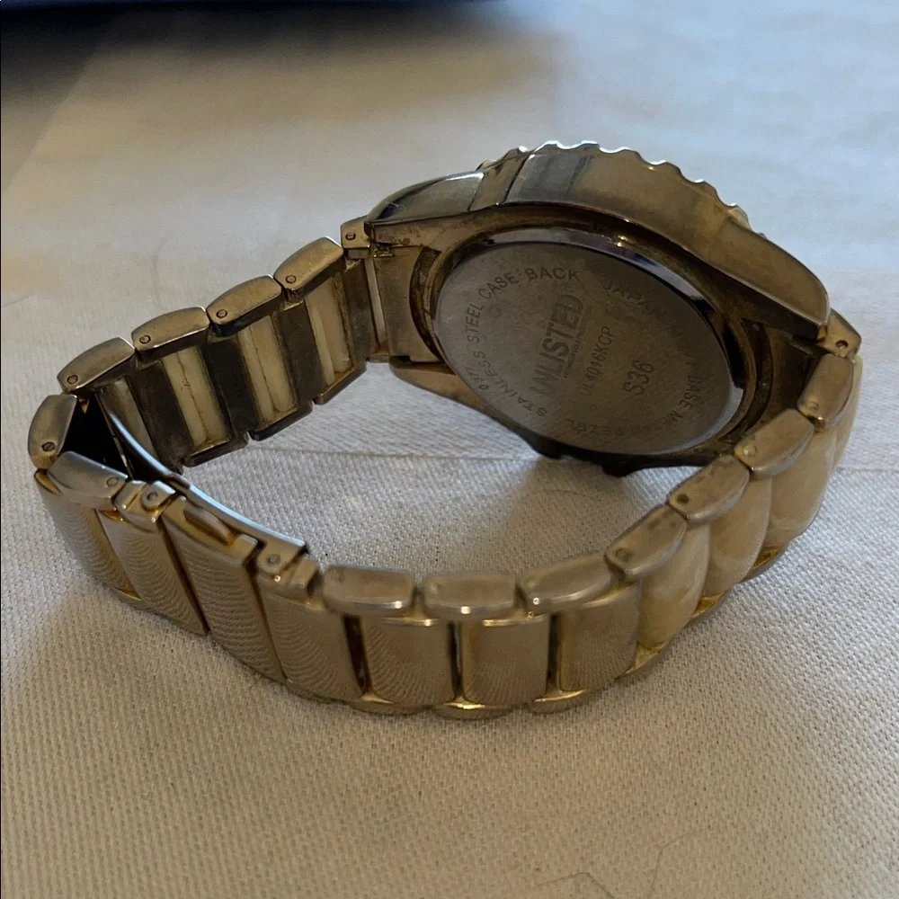 Unlisted by Kenneth Cole Gold-Tone Watch With A Mother-Of-Peal Bracelet Band